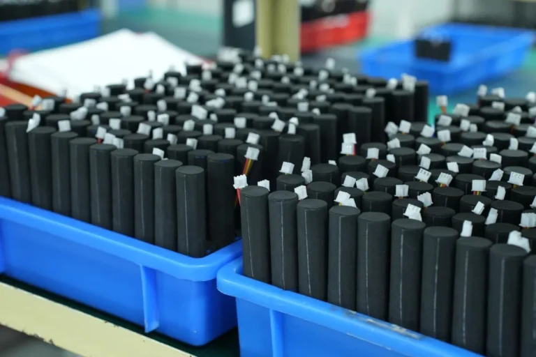 Industrial lithium battery pack with water droplets on enclosure, showing moisture and corrosion risk for battery buyers, water intrusion damage